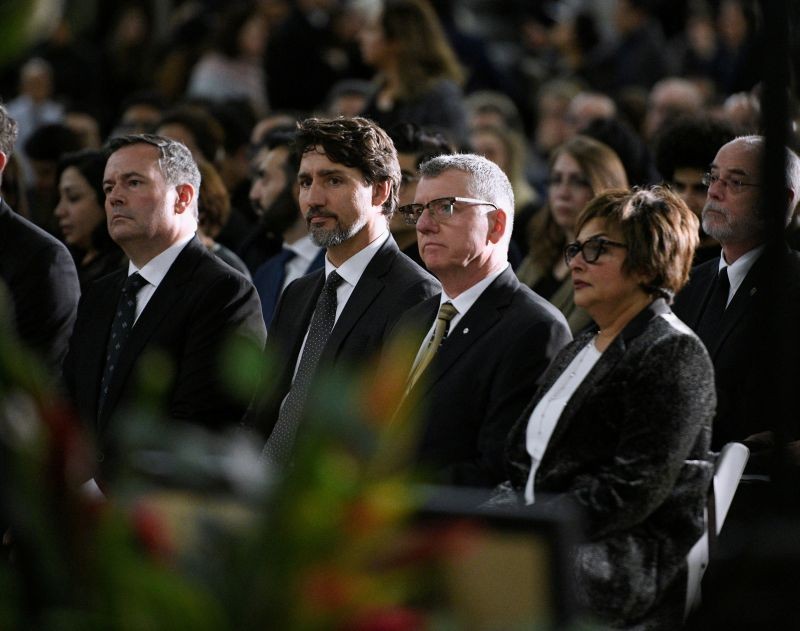 Premier of Alberta Jason Kenney, Prime Minister of Canada Justin Trudeau and David H Turpin, President of the University of Alberta, attend a memorial service at the University of Alberta for the victims of a Ukrainian passenger plane that crashed in Iran, in Edmonton, Alberta, Canada on January 12, 2020. (REUTERS File Photo)