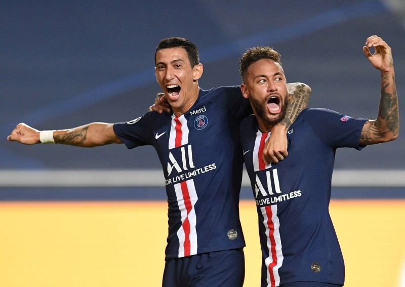 Soccer Football - z League - Semi Final - RB Leipzig v Paris St Germain - Estadio da Luz, Lisbon, Portugal - August 18, 2020  Paris St Germain's Angel Di Maria celebrates scoring their second goal with Neymar, as play resumes behind closed doors following the outbreak of the coronavirus disease (COVID-19)  David Ramos/Pool via REUTERS