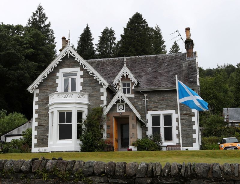 The flag of Scotland flies outside a house at Garelochhead, Scotland, Britain on July 22, 2020. (REUTERS File Photo)