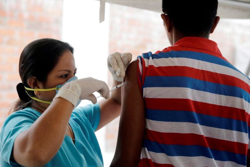 A Venezuelan migrant receives a vaccination at the Binational Border Service Center of Peru, in Tumbes, Peru on June 14, 2019. (REUTERS File Photo)