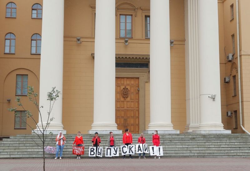 People hold placards reading "Release!" in front of the State Security Committee headquarters as they demand to release those who were detained during recent protests against the presidential election results and all the political prisoners, in Minsk, Belarus on August 19, 2020. (REUTERS Photo)
