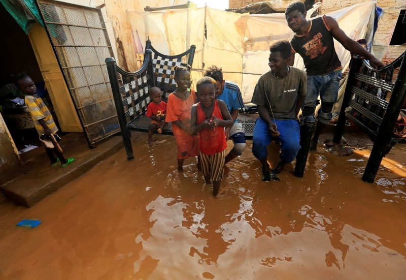 Children are seen in the waters of the Blue Nile floods within the Al-Ikmayr area of Omdurman in Khartoum, Sudan on August 27. (REUTERS Photo)