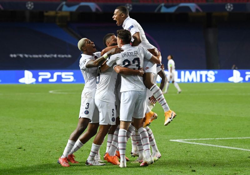 Paris St Germain's Marquinhos celebrates scoring their first goal with Kylian Mbappe and teammates, as play resumes behind closed doors following the outbreak of the coronavirus disease (COVID-19) David Ramos/Pool via REUTERS