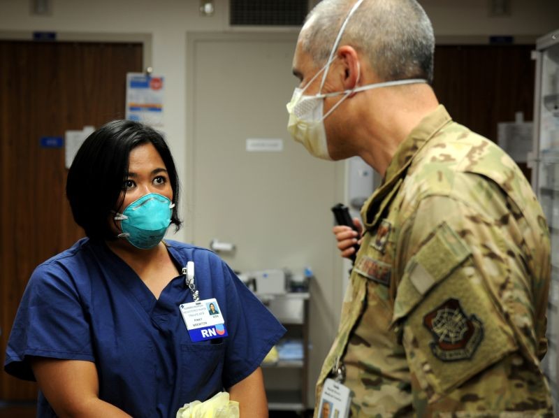 U.S. Air Force Major Pinky Brewton discusses hospital procedures with Air Force Colonel Justin Nast, the commander of COVID Theater Hospital, at Dameron Hospital in Stockton, California, US on July 22, 2020. (REUTERS File Photo)