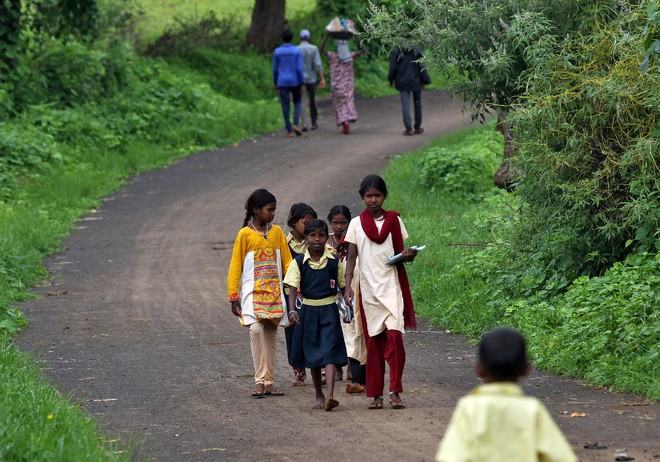 Children walk to attend a class at Dandwal village in Maharashtra. Reuters