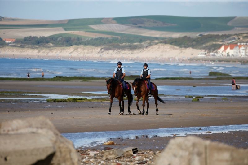 French gendarmes patrol the beach in Tardinghen, France, August 20, 2020. (REUTERS Photo)