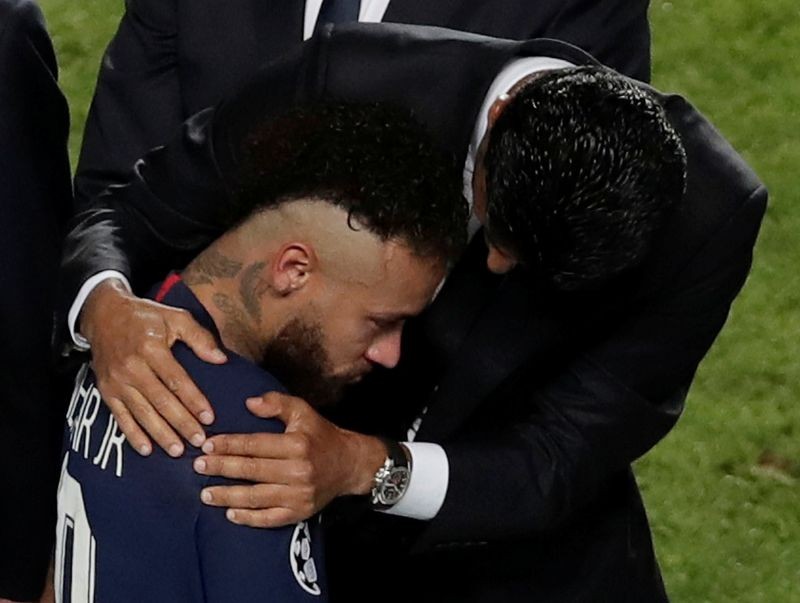 Paris St Germain's Neymar dejected after the match with Paris St Germain President Nasser Al-Khelaifi, as play resumes behind closed doors following the outbreak of the coronavirus disease (COVID-19) Manu Fernandez/Pool via REUTERS