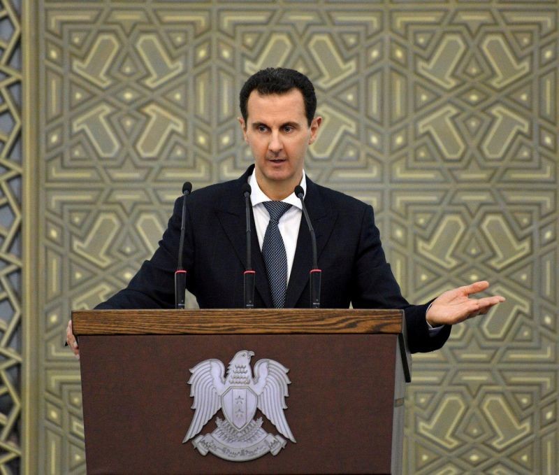 Syria's President Bashar al-Assad speaks during a meeting with heads of local councils, in Damascus, Syria in this handout released by SANA on February 17, 2019. (REUTERS File Photo)