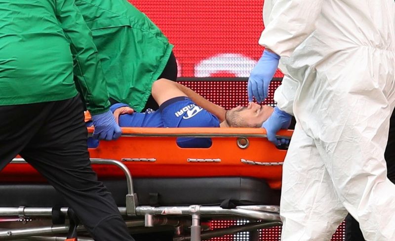 FILE PHOTO: Chelsea's Pedro is stretchered off after sustaining an injury, as play resumes behind closed doors following the outbreak of the coronavirus disease (COVID-19) Pool via REUTERS/Catherine Ivill/File Photo