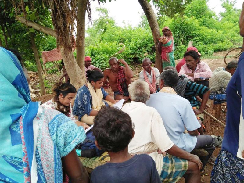 Archana Soreng discusses India’s forest act with tribal members in the village of Ambapadia, in India’s Khorda district in Odisha state. (Archana Soreng Photo)