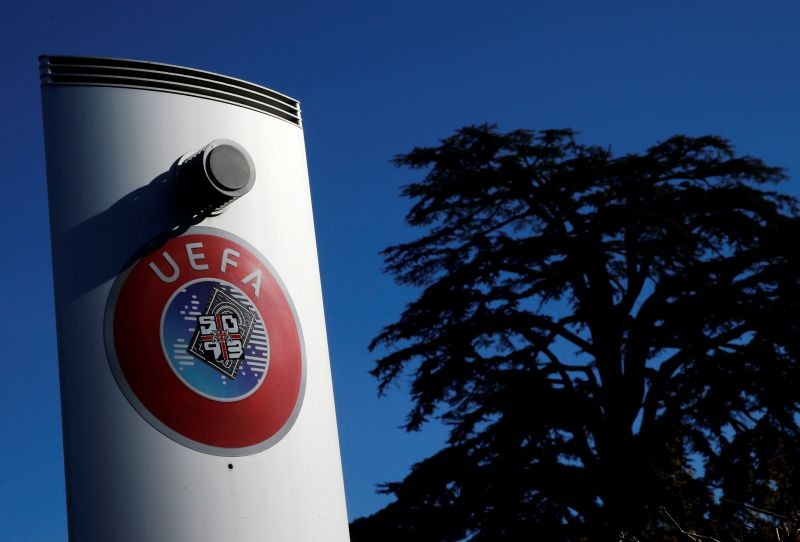 FILE PHOTO: A logo is pictured outside the UEFA in Nyon, Switzerland, February 28, 2020. REUTERS/Denis Balibouse/File Photo