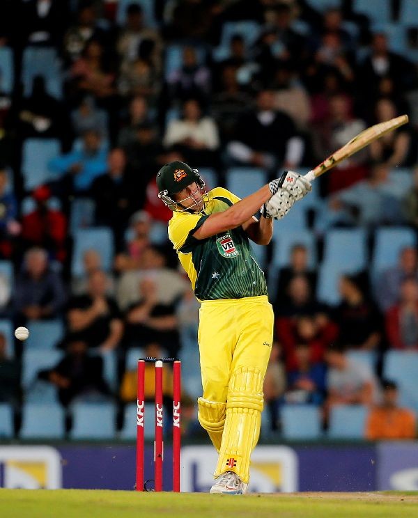 Australia's Cameron White plays a shot during the final of the T20 cricket test match against South Africa  in Centurion, March 14, 2014.  REUTERS/Siphiwe Sibeko/File Photo
