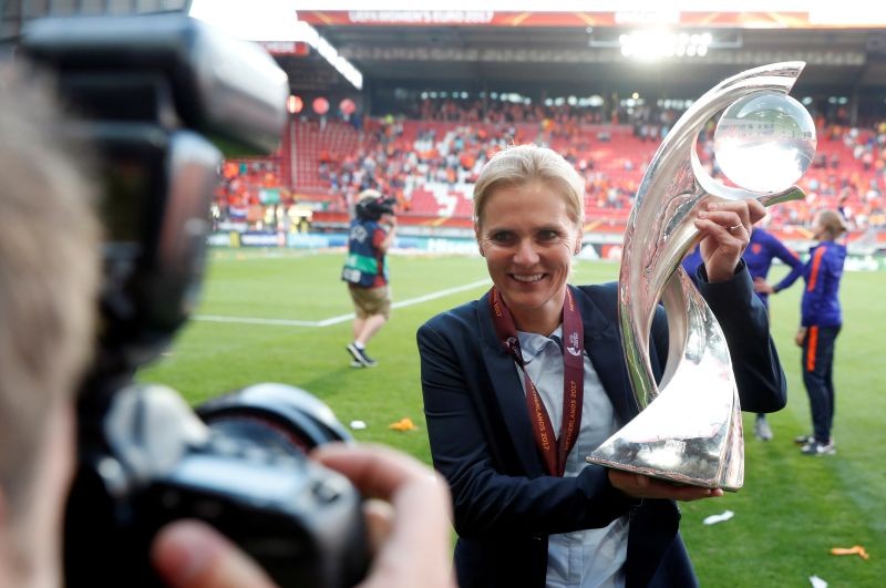 FILE PHOTO: Netherlands coach Sarina Wiegman celebrates with the trophy after winning the Euro 2017 Final REUTERS/Yves Herman