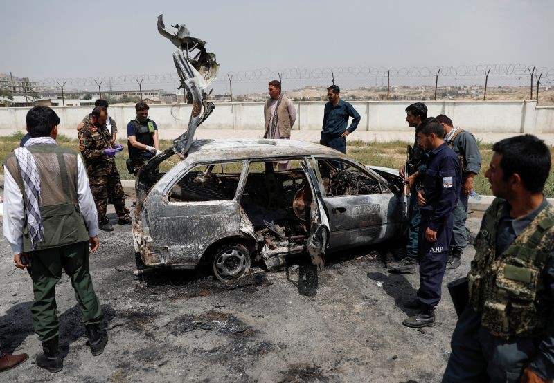 Afghan officials inspect a vehicle from which insurgents fired rockets, in Kabul, Afghanistan on August 18, 2020. (REUTERS Photo)