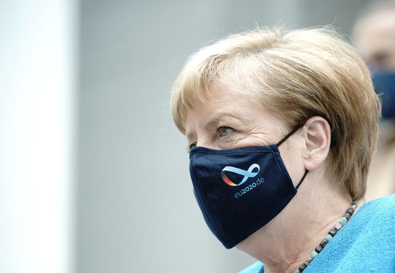 German Chancellor Angela Merkel wears a mask as she leaves her annual summer news conference during the outbreak of the coronavirus disease (COVID-19) in Berlin, Germany on August 28. (REUTERS Photo)