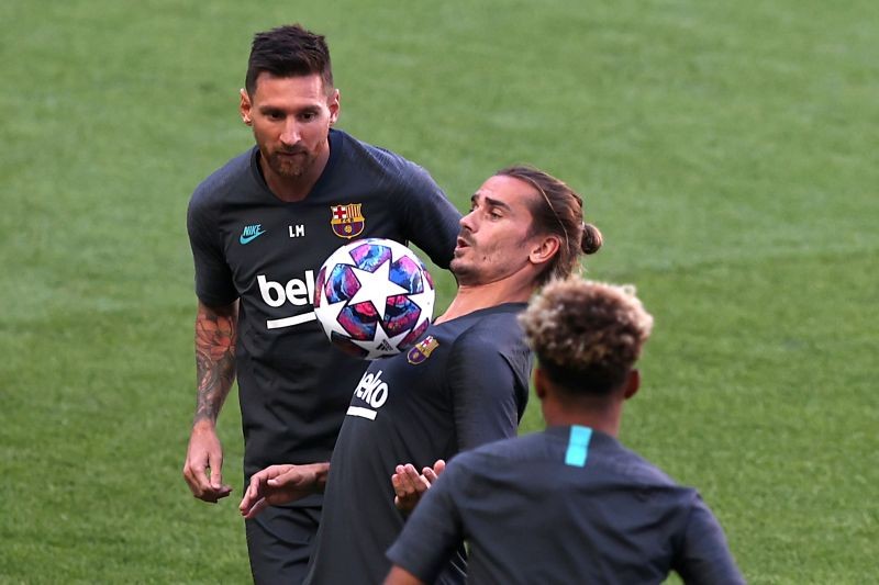 FC Barcelona's Antoine Griezmann and Lionel Messi during training REUTERS/Rafael Marchante/Pool