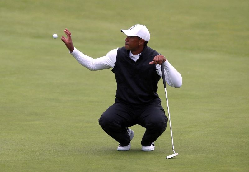 FILE PHOTO: Tiger Woods of the U.S. on the 18th hole during the second round REUTERS/Paul Childs/File Photo