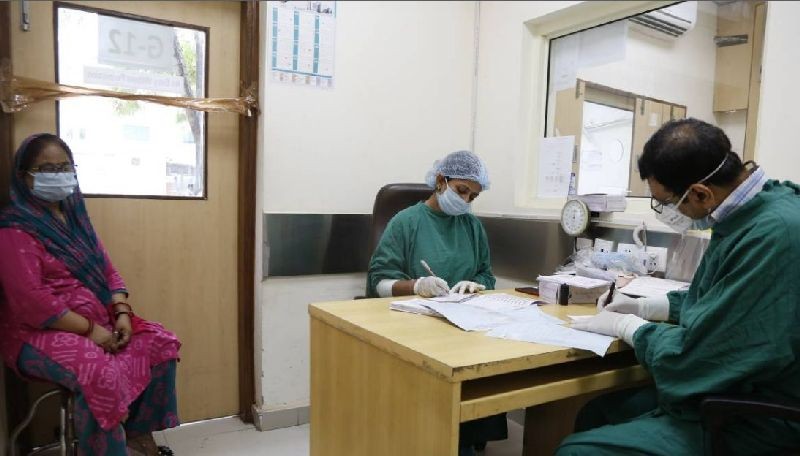 A tuberculosis patient sits during a check-up at a hospital in New Delhi, India on July 23, 2020. Thomson Reuters Foundation/Annie Banerji