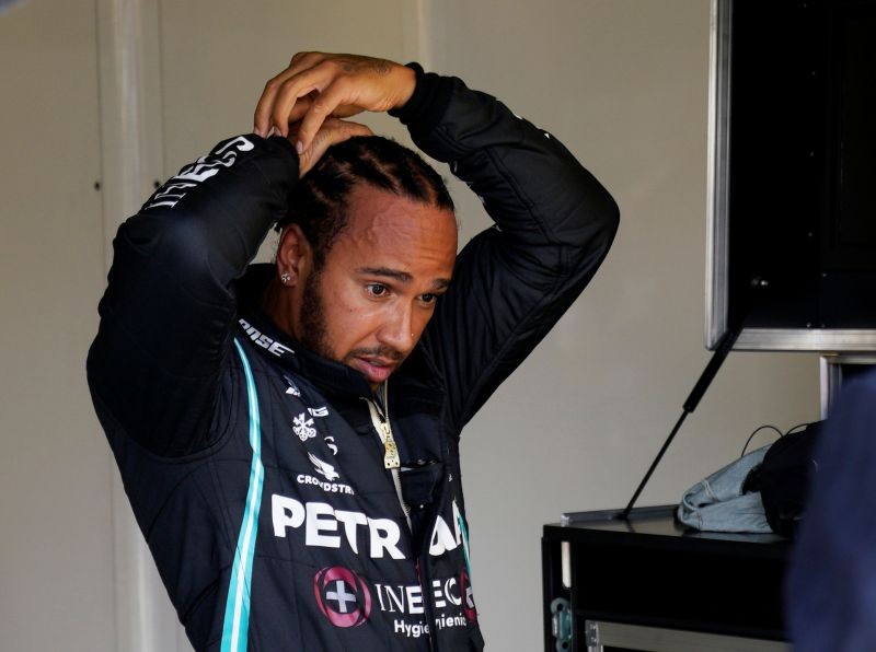 Mercedes' Lewis Hamilton reacts after qualifying in pole position Will Oliver/Pool via REUTERS