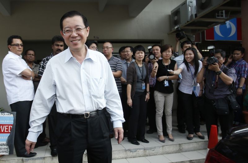 Chief minister of Malaysia's state of Penang Lim Guan Eng of the opposition Democratic Action Party smiles as he leaves a meeting in Kuala Lumpur on April 4, 2013.  (REUTERS File Photo)