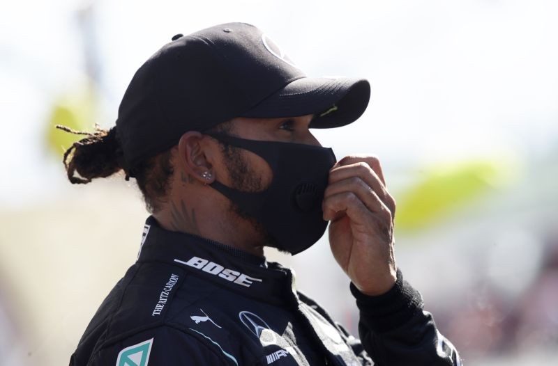 Formula One F1 - Tuscan Grand Prix - Mugello, Scarperia e San Piero, Italy - September 12, 2020 Mercedes' Lewis Hamilton celebrates qualifying in pole position Pool via REUTERS/Luca Bruno