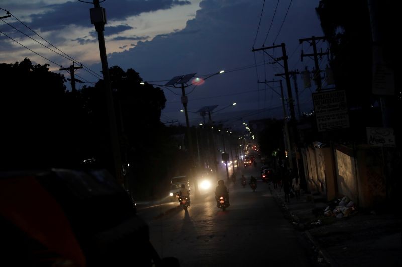 Vehicles drive along Delmas road at dusk in Port-au-Prince, Haiti on August 11, 2020. (REUTERS File Photo)