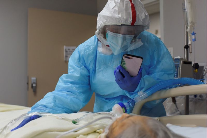 While FaceTiming her siblings, Angelica Mendez, 48, says goodbye to her mother, Catalina Salazar, 86, who was struggling to fight the coronavirus disease (COVID-19) and who died later in the day, at United Memorial Medical Center in Houston, Texas, US on September 8, 2020. (REUTERS File Photo)