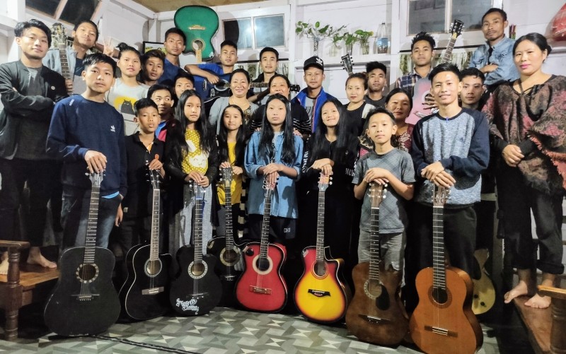 Trainers with the students attending the free basic guitar training held in Tuensang village. (Morung Photo)