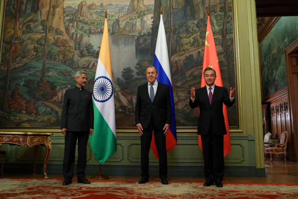 Russia's Foreign Minister Sergei Lavrov, India's Foreign Minister Subrahmanyam Jaishankar and China's State Councillor Wang Yi pose for a picture during a meeting in Moscow, Russia September 10, 2020. (Russian Foreign Ministry/Handout via REUTERS)