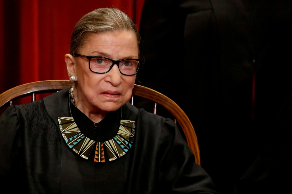 FILE PHOTO: U.S. Supreme Court Justice Ruth Bader Ginsburg participates in taking a new family photo with her fellow justices at the Supreme Court building in Washington, D.C., U.S., June 1, 2017. (REUTERS/Jonathan Ernst)