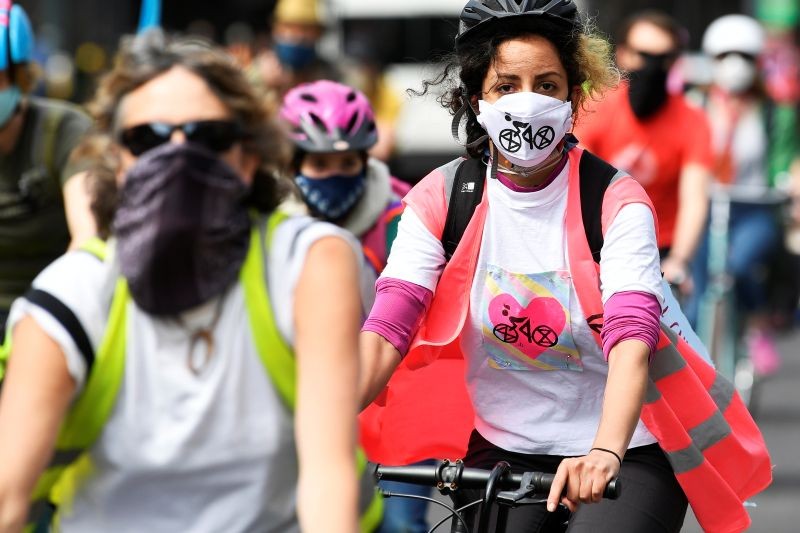 Members of Extinction Rebellion take part in a socially distanced bicycle ride to campaign for more cycling and cycle lanes and fewer vehicles on the roads, following the outbreak of the coronavirus disease (COVID-19), London, Britain on May 17, 2020. (REUTERS File Photo)
