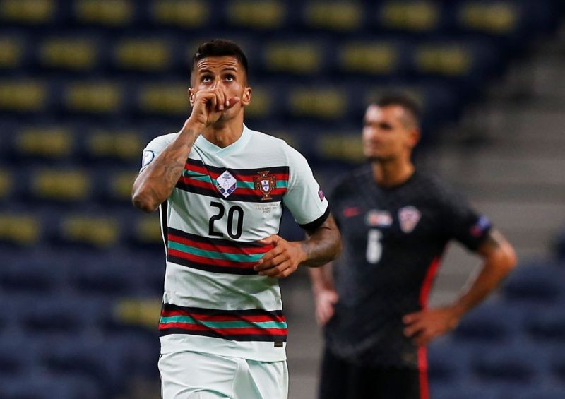 Portugal's Joao Cancelo celebrates scoring their first goal REUTERS/Rafael Marchante