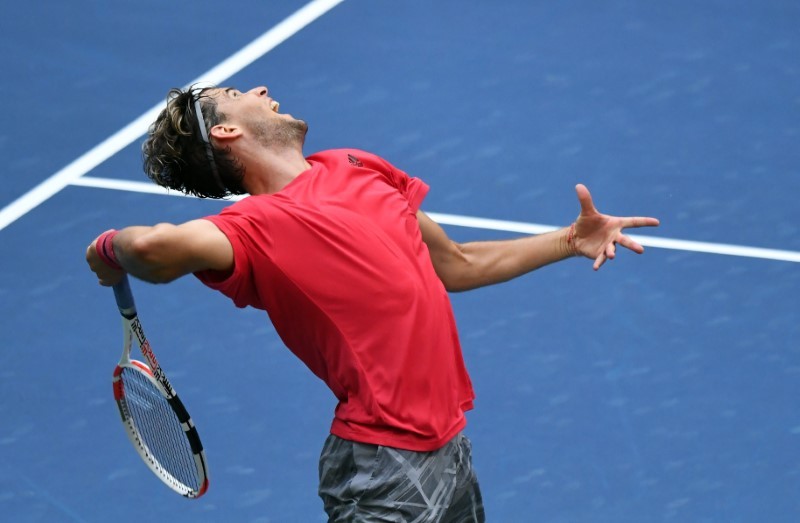 Dominic Thiem of Austria serves the ball against Felix Auger-Aliassime of Canada on day eight of the 2020 U.S. Open tennis tournament at USTA Billie Jean King National Tennis Center. Danielle Parhizkaran-USA TODAY Sports