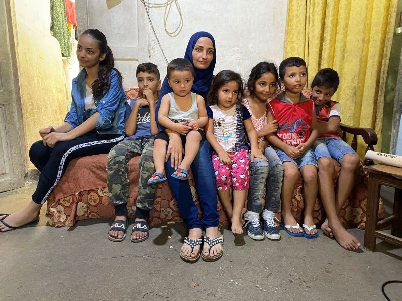 The wife and children of Mohammed Ghandour, a Lebanese who attempted to leave to Cyprus by boat, are pictured inside a room in Tripoli, Lebanon September 14, 2020. ( REUTERS Photo)