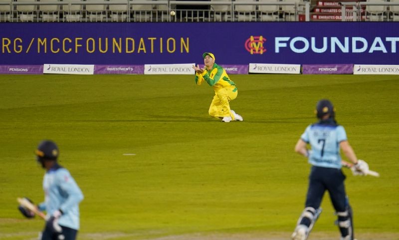 Australia's David Warner takes a catch to dismiss England's Sam Billings Jon Super/Pool via REUTERS