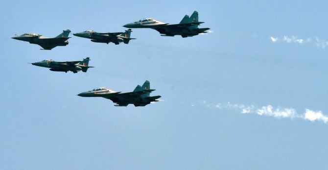 Air display of the first batch of IAF’s Rafale aircraft in an arrow formation in Ambala. Photograph: Manvender Vashist/PTI Photo