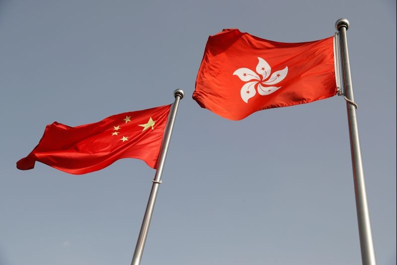 The Chinese and Hong Kong flags flutter at the office of the Government of the Hong Kong Special Administrative Region, ahead of a news conference held by Hong Kong Chief Executive Carrie Lam, in Beijing, China on June 3, 2020.( REUTERS File Photo)
