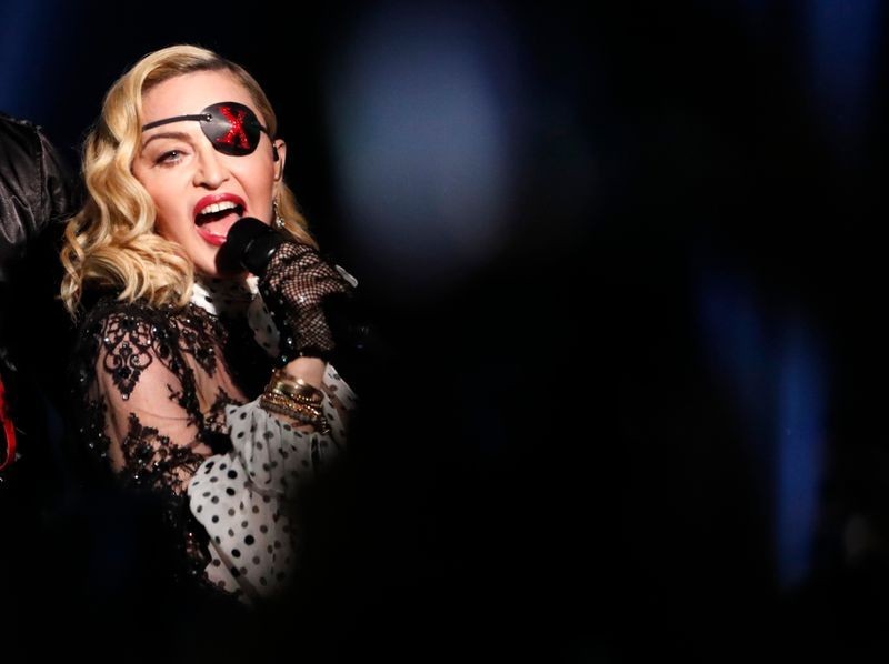 Madonna performs with Maluma (not shown). REUTERS/Mario Anzuoni/Files