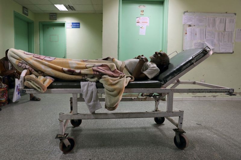 A patient lies on a bed as he waits for a dialysis session at al-Thawra hospital in Sanaa, Yemen September 13, 2020. (REUTERS File Photo)
