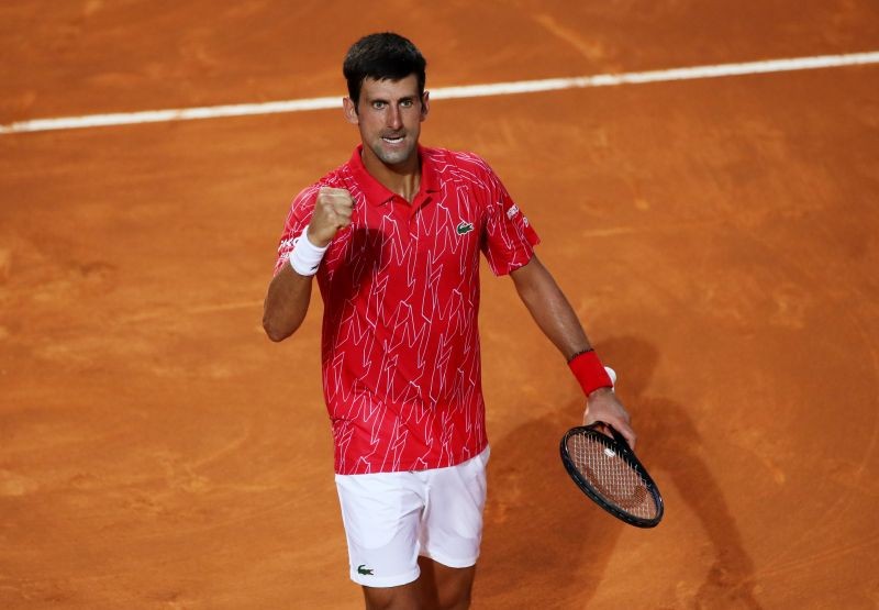 Serbia's Novak Djokovic celebrates winning the final against Argentina's Diego Schwartzman Pool via REUTERS/Clive Brunskill