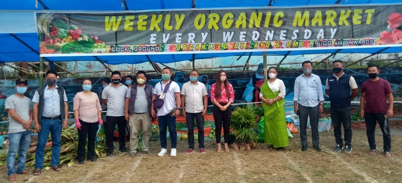 Kevinourheno Seyie with AYO and KMC officials and others during the inauguration of weekly organic market in Kohima on September 9. (Morung Photo)