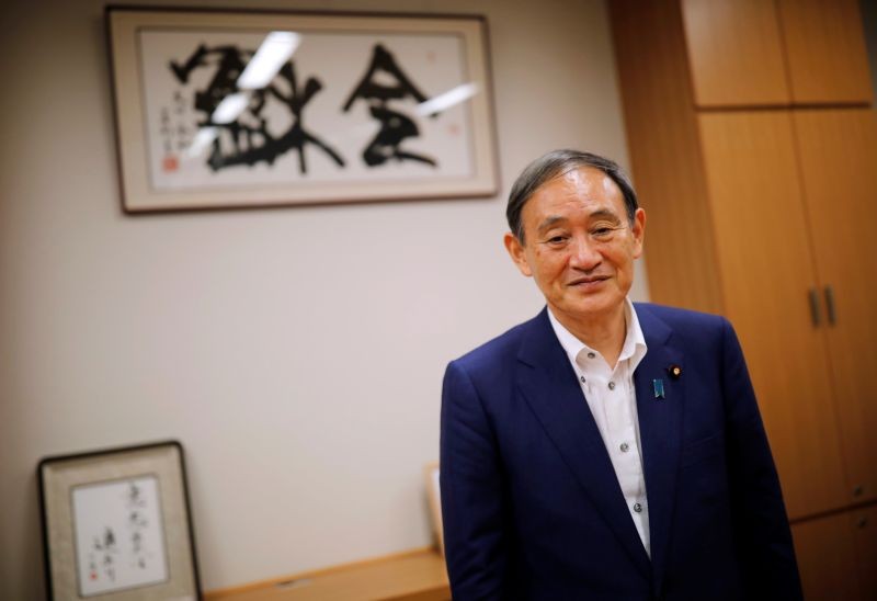 Japan's top government spokesman Chief Cabinet Secretary Yoshihide Suga attends an interview with Reuters in Tokyo, Japan on August 26, 2020. (REUTERS File Photo)