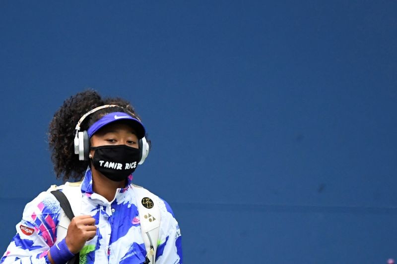 Naomi Osaka of Japan walks onto the court wearing a mask with the name of Tamir Rice prior to her match against Victoria Azarenka of Belarus (not pictured) in the women's singles final on day thirteen of the 2020 U.S. Open tennis tournament at USTA Billie Jean King National Tennis Center. Mandatory Credit: Danielle Parhizkaran-USA TODAY Sports/File Photo
