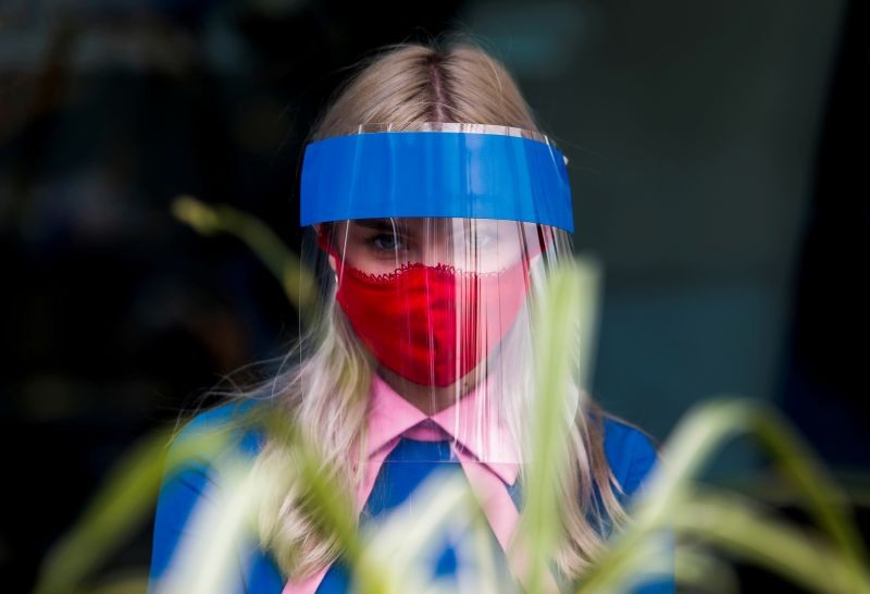 A restaurant employee wears a protective face shield and mask due to the coronavirus disease (COVID-19) outbreak in Moscow, Russia on July 8, 2020. (REUTERS File Photo)