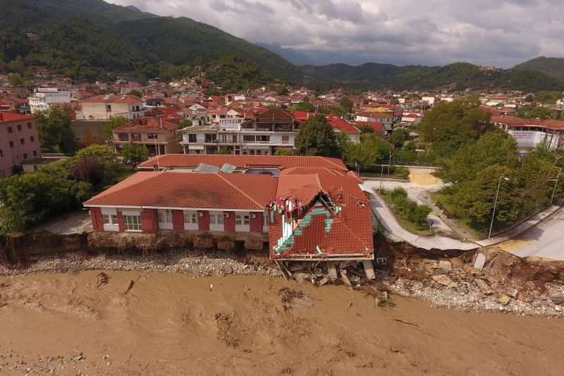 A view of a partially collapsed medical center next to the flooded Pamisos river, following a storm in the town of Mouzaki, in central Greece on September 19, 2020. Picture taken with a drone. (REUTERS Photo)