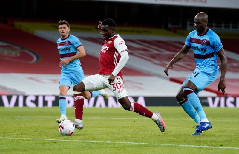 Arsenal's Eddie Nketiah scores their second goal. Pool via REUTERS/Will Oliver