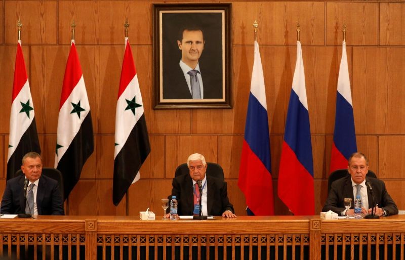 Russian Deputy Prime Minister Yuri Borisov, Foreign Minister Sergei Lavrov, and Syria's Foreign Minister Walid Muallem attend a press conference in Damascus, Syria on September 7. (REUTERS Photo)