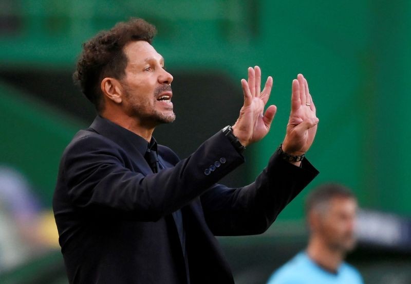 FILE PHOTO: Atletico Madrid coach Diego Simeone, as play resumes behind closed doors following the outbreak of the coronavirus disease (COVID-19) Lluis Gene/Pool via REUTERS/File Photo