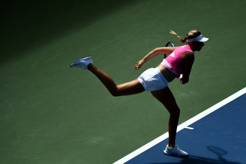 Amanda Anisimova of the United States serves against Katrina Scott of the United States (not pictured) on day four of the 2020 U.S. Open tennis tournament at USTA Billie Jean King National Tennis Center. Mandatory Credit: Danielle Parhizkaran-USA TODAY Sports