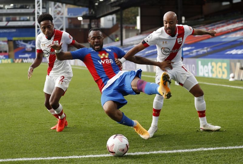 Crystal Palace's Jordan Ayew in action with Southampton's Nathan Redmond and Kyle Walker-Peters Pool via REUTERS/Alastair Grant